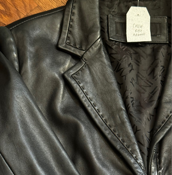 A thrifted leather piece styled at a Cassie Rose pop-up